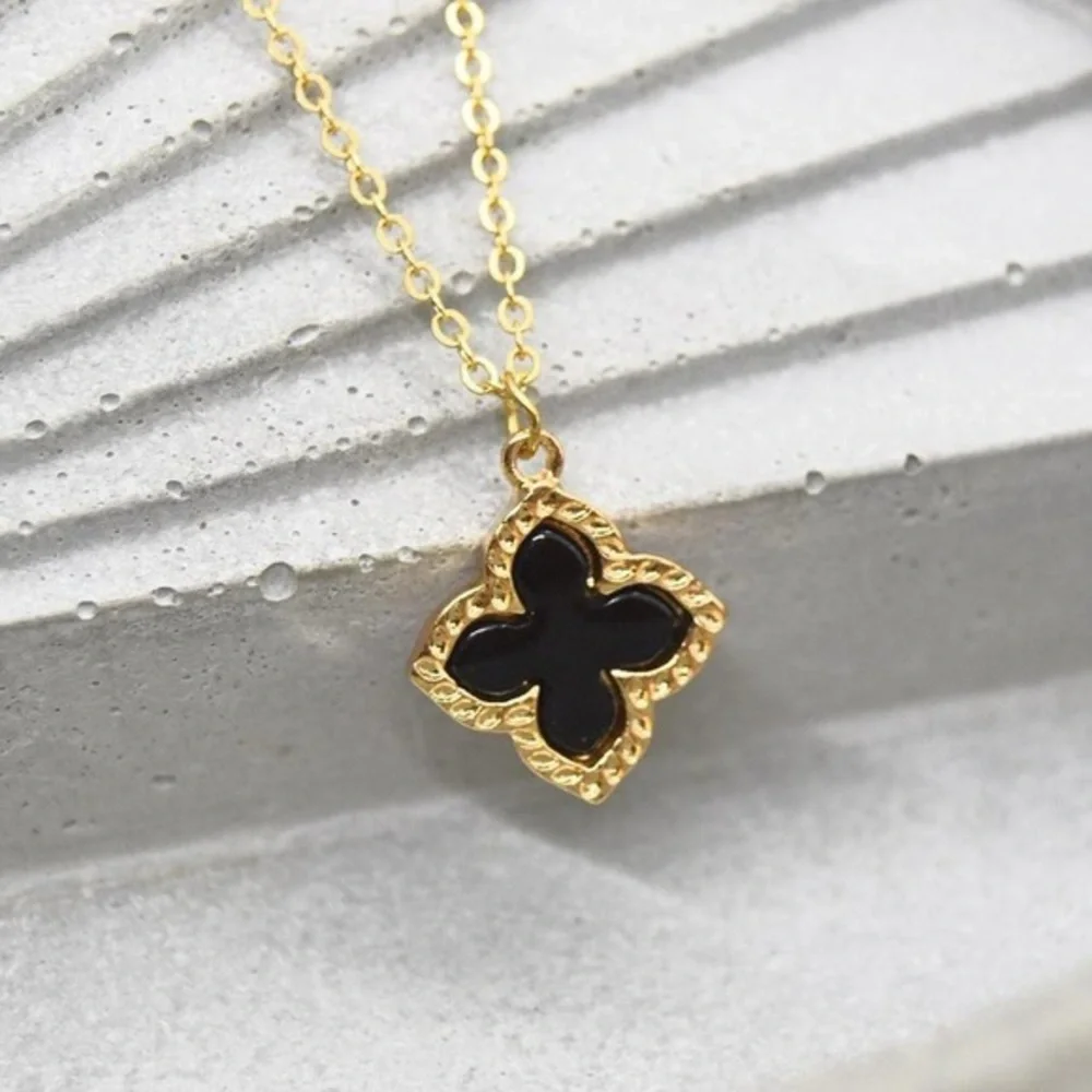 Gold Necklace with Black Clover Pendant